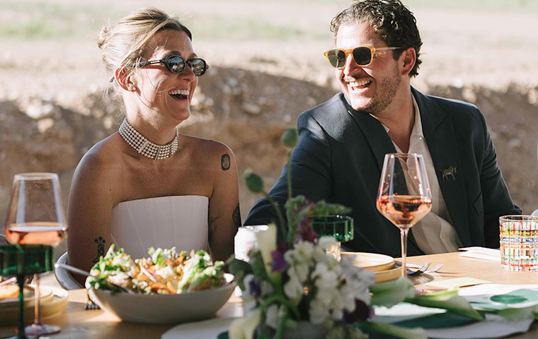 wedding catering in Taos New Mexico - bride and groom laughing