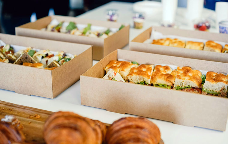 craft services table with sandwiches